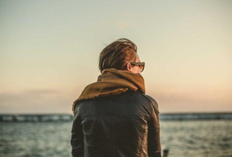 A person outdoors at sunset